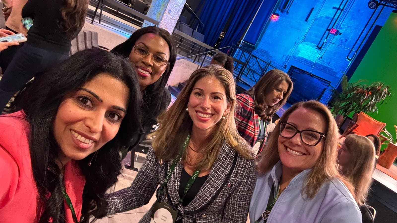 Members taking a photograph together at a leadership summit